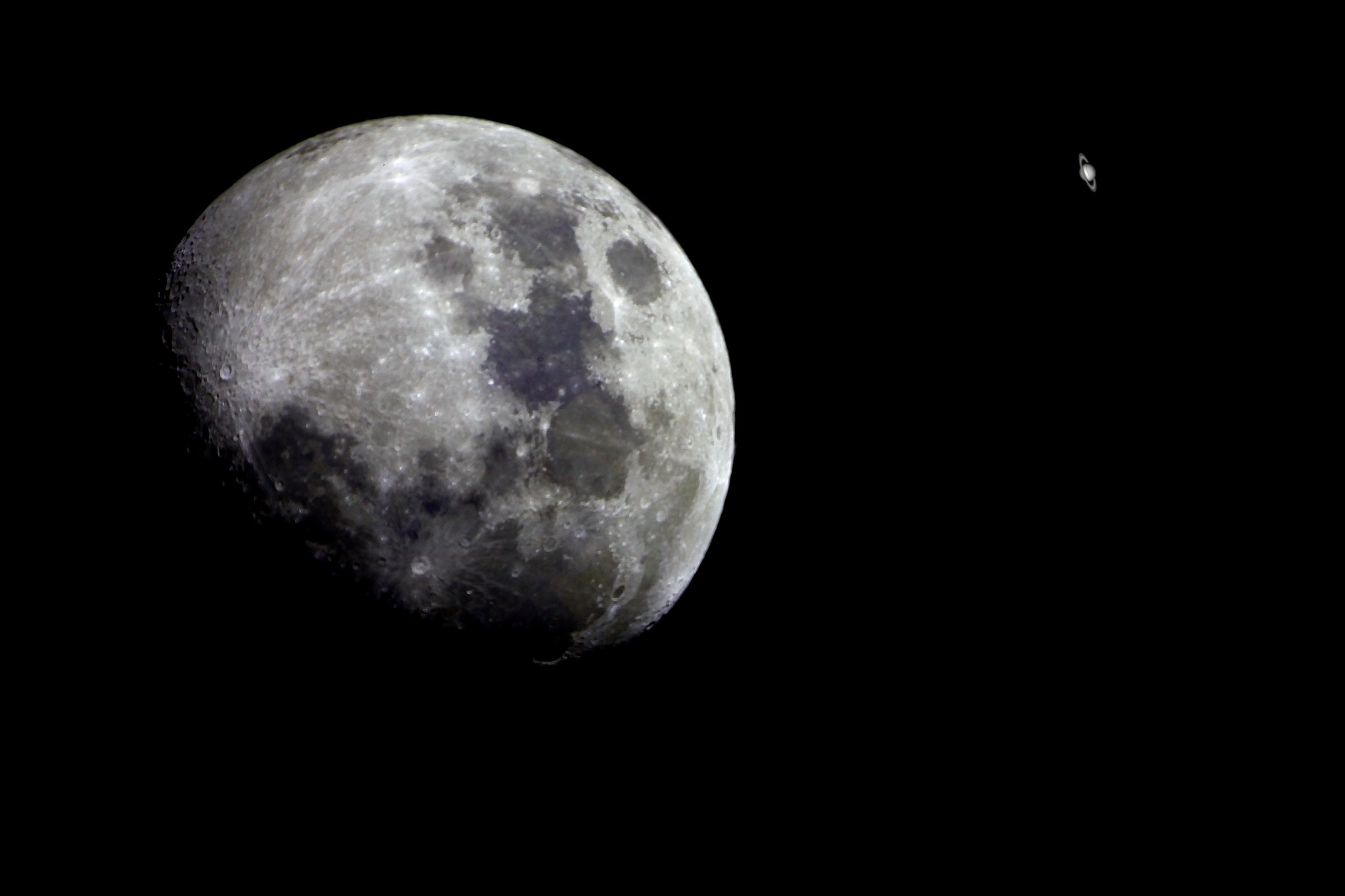 A composite image from two observation made on the Westwood Plateau Coquitlam, during a conjunction of Saturn with the moon 